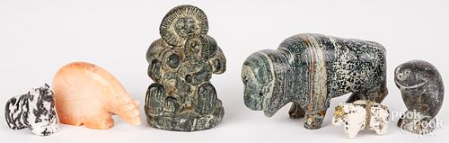 Four carved stone fetish animals, etc.