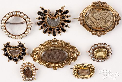 Eight antique gold, hairwork, pearl, brooches