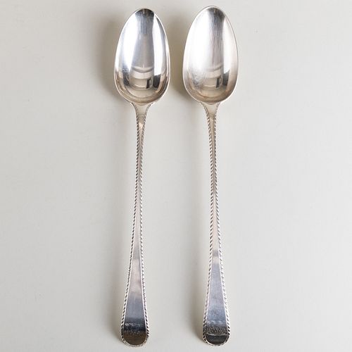 Pair of George III Silver Stuffing Spoons with Feather Edge and Crest