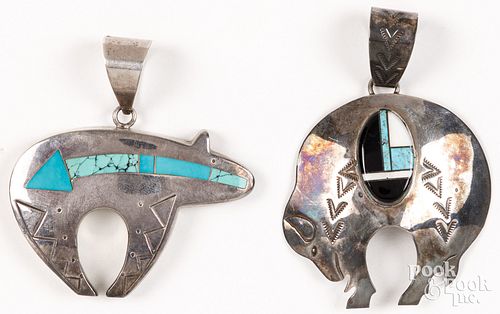Two Navajo Indian sterling silver pendants