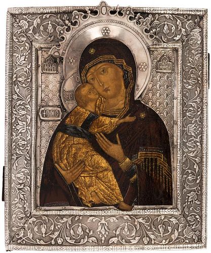 A RUSSIAN ICON OF THE VLADIMIRSKAYA MOTHER OF GOD IN A SILVER BASMA OKLAD, 19TH CENTURY