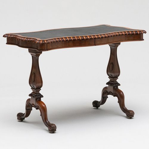 Victorian Carved Walnut and Leather Writing Table, Stamped Gillows