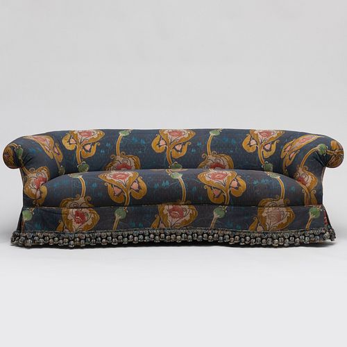 Victorian Walnut and Upholstered Sofa with a Tasseled Apron