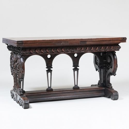 Renaissance Revival Stained and Carved Walnut Extending Library Table
