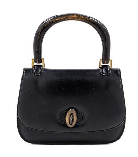 A Gucci Black Leather Handbag, 10" x 7.5" x 1.5".