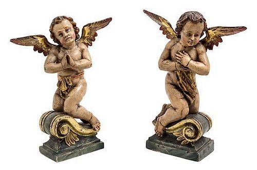 * A Pair of Continental Polychromed Figural Ornaments Height 12 1/4 inches.