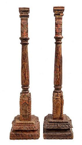 * A Near Pair of Indian Painted Wood Prickets Height 34 3/4 inches.