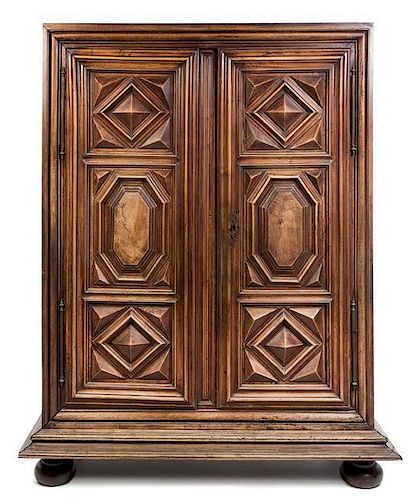 * A Louis XIII Walnut Armoire Height 89 1/2 x width 68 x depth 22 inches.
