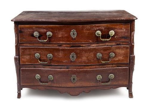 * A Louis XV Provincial Walnut Commode Height 32 x width 47 x depth 29 inches.