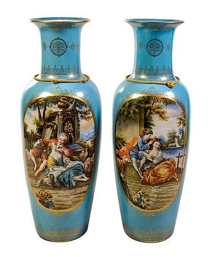 A Pair of Large Sevres Style Porcelain Vases Height 47 3/4 inches.