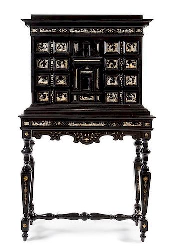 An Italian Inlaid Ebonized Cabinet on Stand Height 71 1/4 x width 42 x depth 18 1/4 inches.