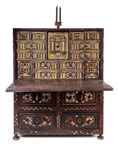 * A Spanish Baroque Walnut Vargueno and Chest Height 61 1/2 x width 49 1/2 x depth 18 inches.