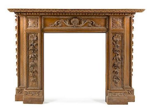 * An English Carved Fireplace Mantel Height 48 3/4 x width 67 1/4 x depth 10 inches.