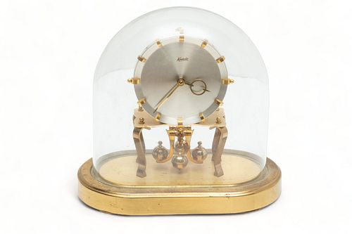 Kunda Perpetual Motion Clock Under Glass Dome Ca. 1950, H 9" W 9.5"