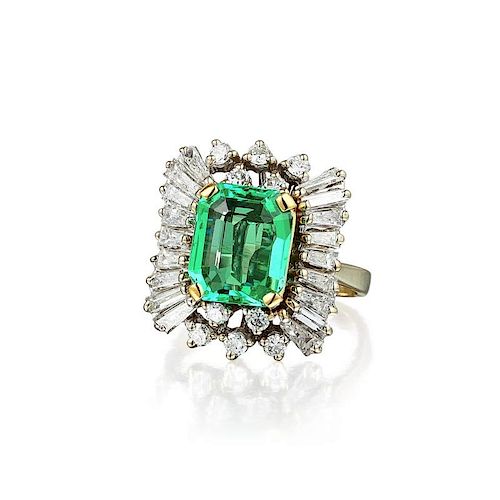 A Diamond and Emerald Ring