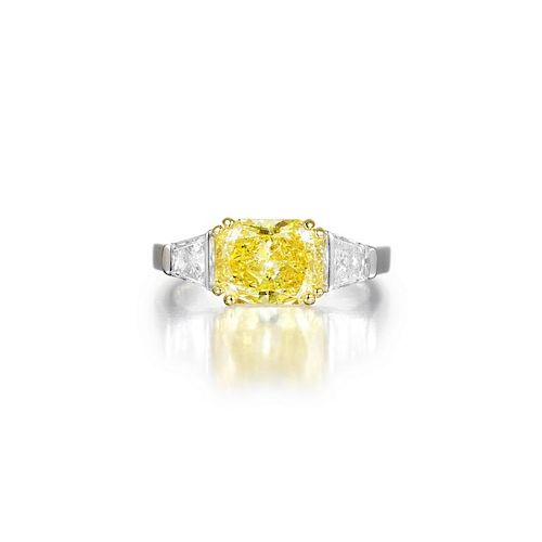 A Fancy Intense Yellow Diamond Ring