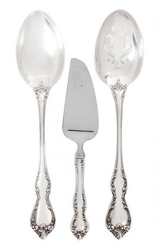 Three American Silver Serving Pieces, Towle, Newburyport, MA, in the Debussy pattern, comprising a slotted spoon, serving spo
