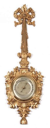 An English Gilt Barometer Height 40 inches.