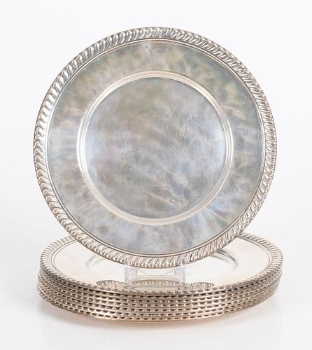 A Set of Eight Sterling Plates