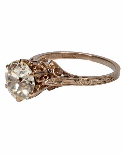 A diamond and 14k white hold solitaire ring