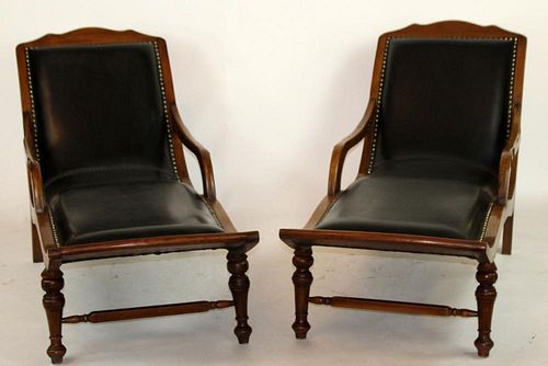 Pair of mahogany and leather chaise longues