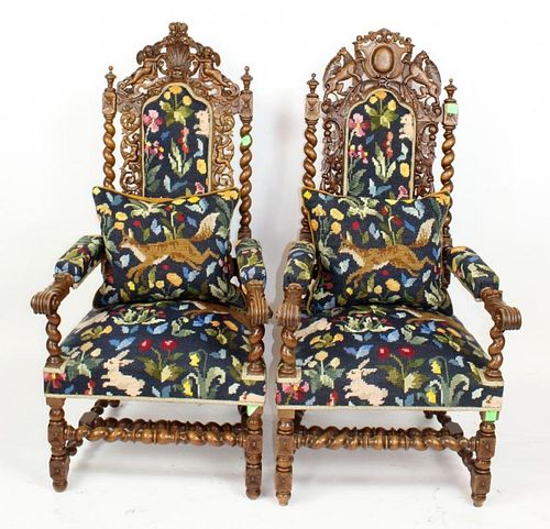 Pair of French Louis XIII carved oak fauteuils