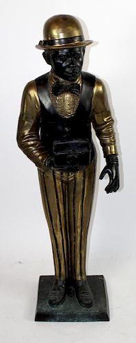 Bronze statue man wearing derby hat
