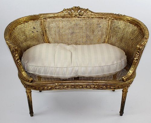 Louis XVI style caned settee