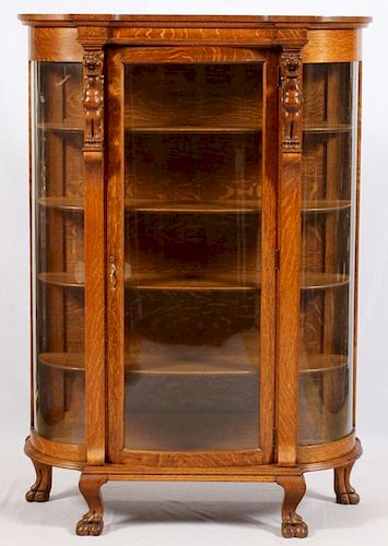 LATE VICTORIAN CARVED OAK DISPLAY CABINET