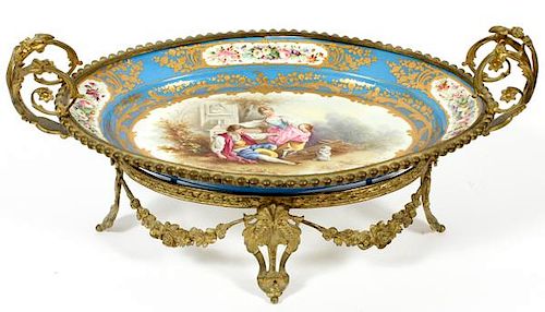 FRENCH PORCELAIN AND GILT METAL CENTERPIECE