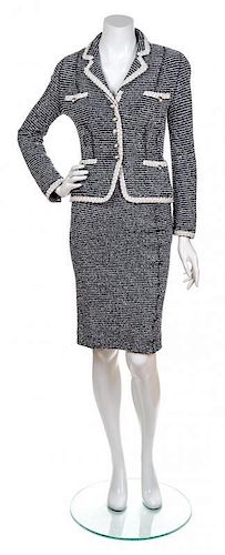 A Moschino Boucle Suit, Jacket Size 40.