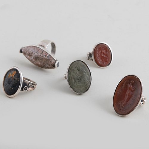Group of Five Silver-Mounted Hardstone Rings