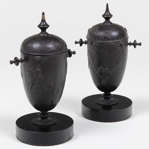 Pair of Small Bronze Covered Urns 