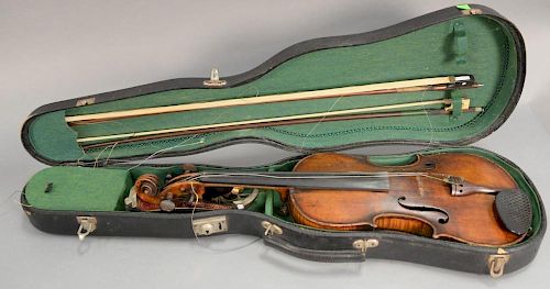 Early violin with two bows in fitted case with Antonio Stradivarius 1752 label on inside. lg. 23 1/2in.