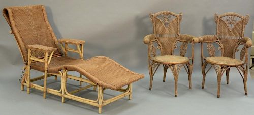 Three piece lot including pair of fancy wicker armchairs and a wicker chaise lg. 77in.