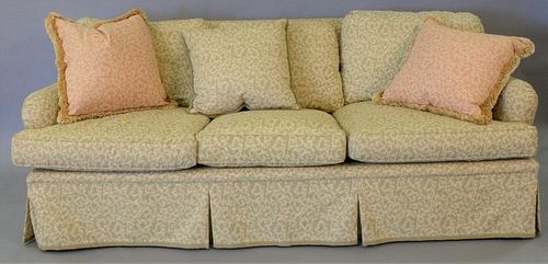 Custom upholstered sofa, green and tan with scrolling leaf design down filled cushions. wd. 80in.