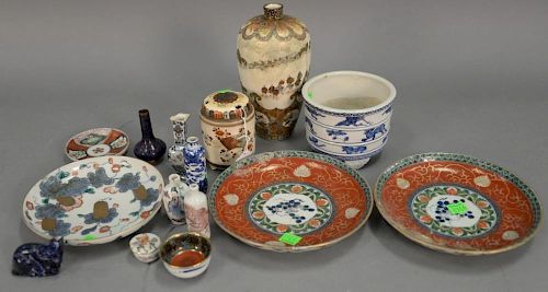 Two tray lots with Asian porcelain including three snuff bottles, three Japanese dishes, Satsuma vase, cloisonne vase, etc.
