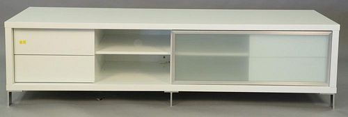 Contemporary tv stand with sliding glass door. ht. 20in., wd. 70in., dp. 23in.