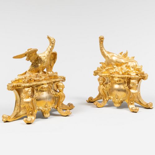 Pair of Régence Style Gilt-Bronze Chenets, One a Phoenix, the Other a Salamander