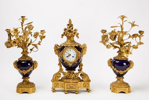Fabrege Gilt Bronze and Porcelain Clock Set