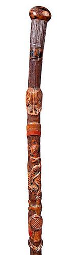 4. Mexican Folk-Art Cane- Ca. 1925- A nice example of this genre carving including high relief eagles – lizards- snakes and