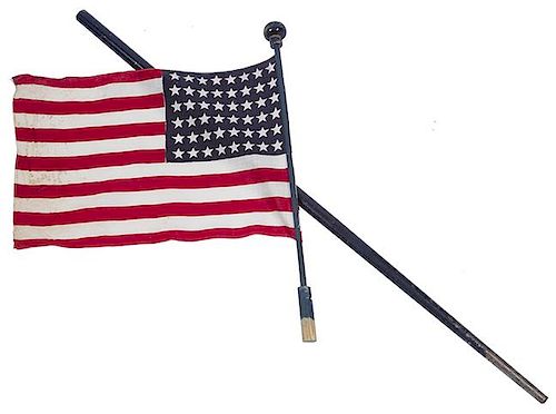 6. American Flag Parade Cane – Ca. 1930- A compartment cane which holds a 48 star flag in nice condition, hardwood knob han