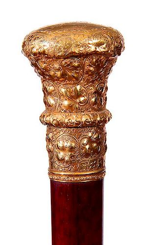 28. Gold Dress Cane- Ca. 1885- A massive ornate gold filled handle which was presented to “The Catholic Society, Middlevill