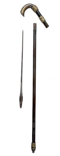 81. Gun Cane- Ca. 1880- A horn handle percussion gun cane with an un-working mechanism with push button trigger, a 20” blad