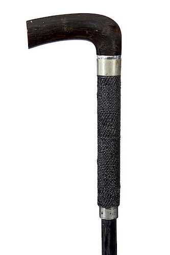 98. Push Dagger Cane- Ca. 1885- A buffalo horn handle with a silver collar engraved “Reverend Fish,” the lower handle has