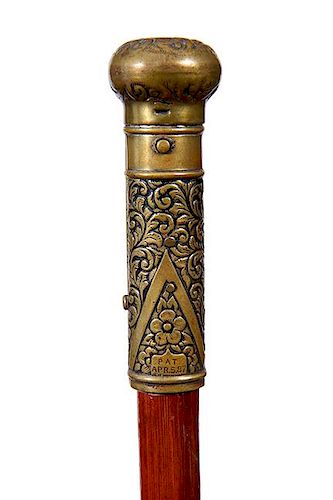 135. Candlestick Cane- Pat. 1887- A brass handle with a push button mechanism which springs the top also a push up candle cup