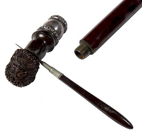 145. Beheading System Cane- Ca. 1880- A nice cast gutta percha handle of a bearded man, the handle unscrews from the shaft to