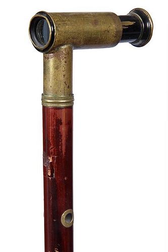 189. Telescope Cane- Ca. 1880- A one draw brass telescope in working condition which is 3” long, brass collar with a matchi