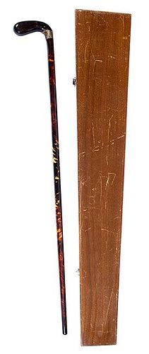 203. Tortoise Dress Cane - Ca. 1900 – Pistol grip handle with very deep hues with a 1” thickness and a small shrinkage se