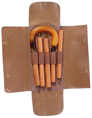 263. Suitcase Cane – Ca. 1920 – A five section hardwood shaft with a Bakelite style handle and a horn ferrule.  H. - 4”
